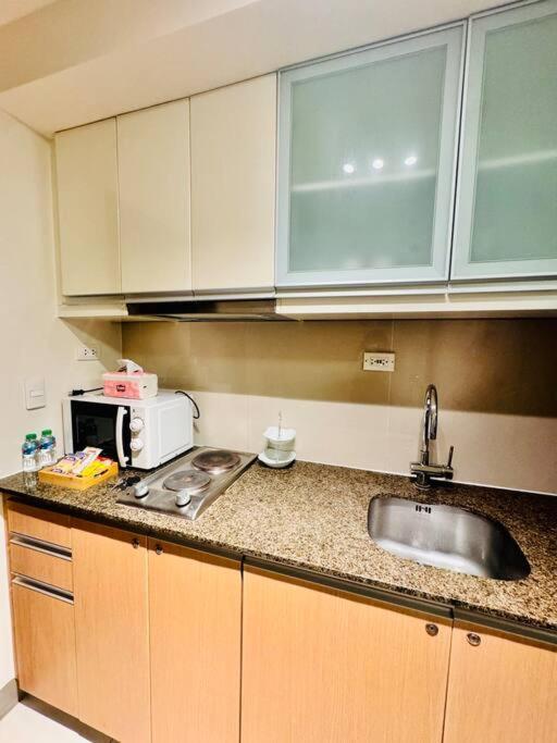 One Uptown Residences Bgc Taguig Esterno foto