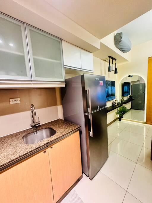 One Uptown Residences Bgc Taguig Esterno foto